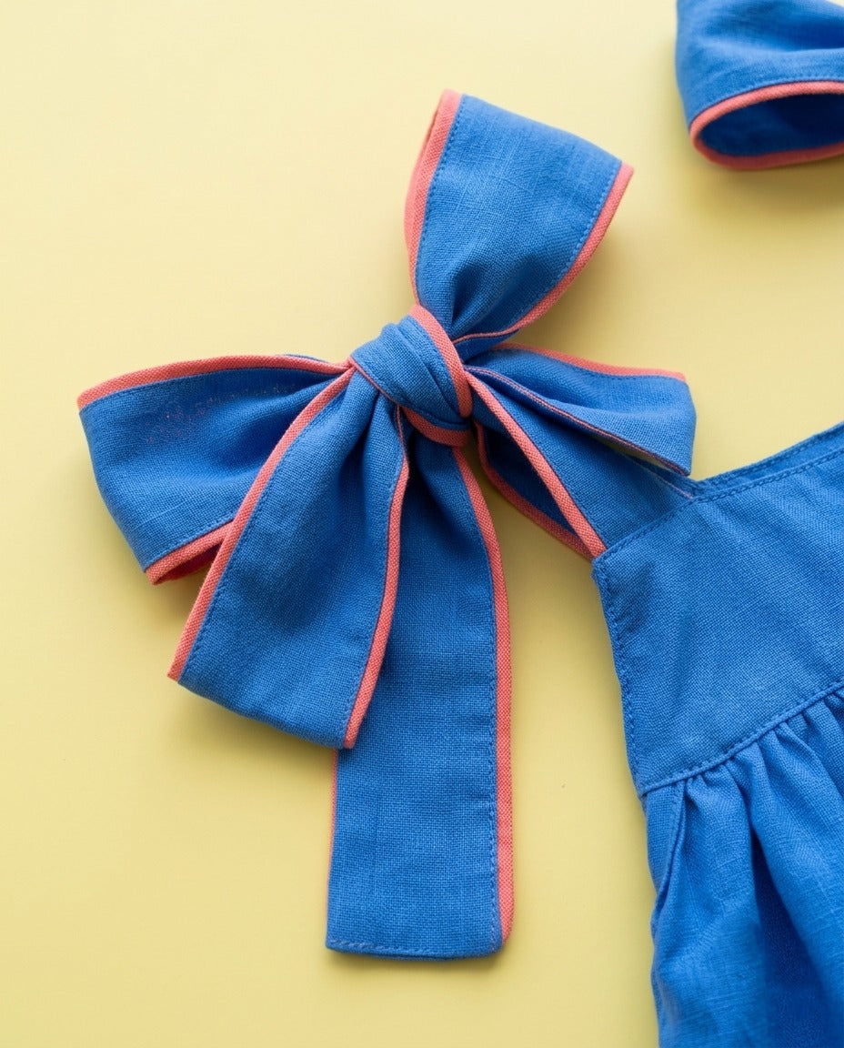 Conjunto azul com laços - foto 2